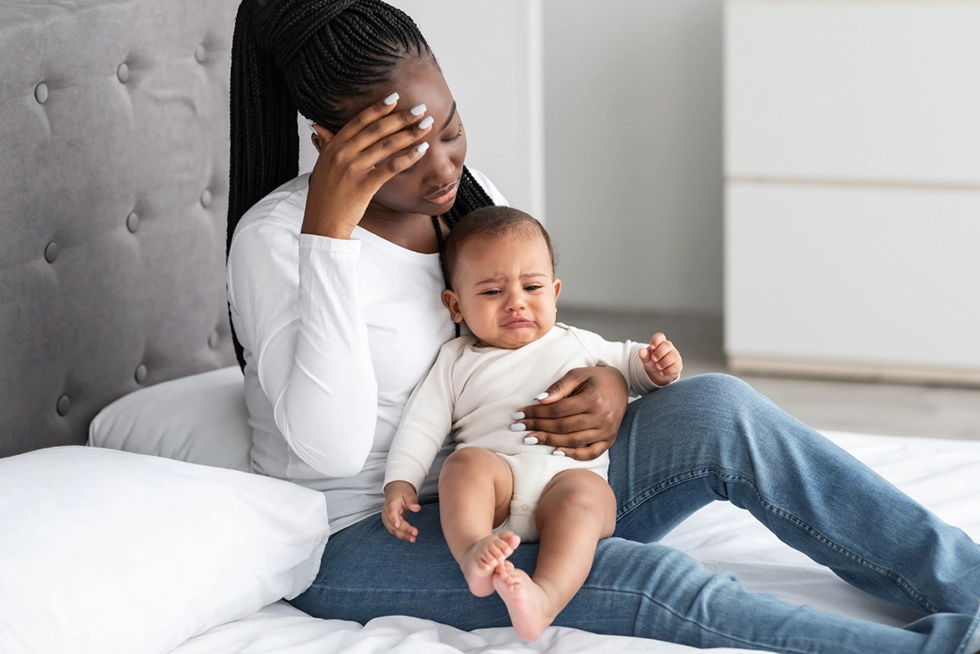 Mom receiving compassionate maternal mental health care in Newport Mesa.