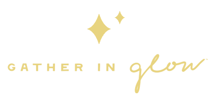 New Mom School tagline graphic that reads "Gather in glow" with two gold sparkle icons above the text.