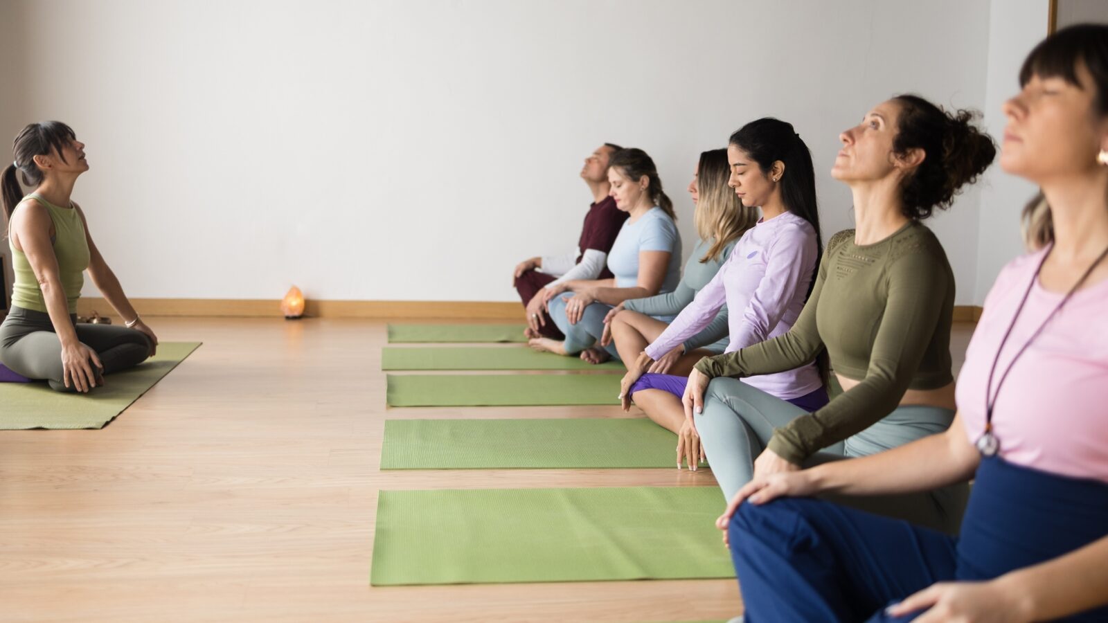 Women doing prenatal yoga